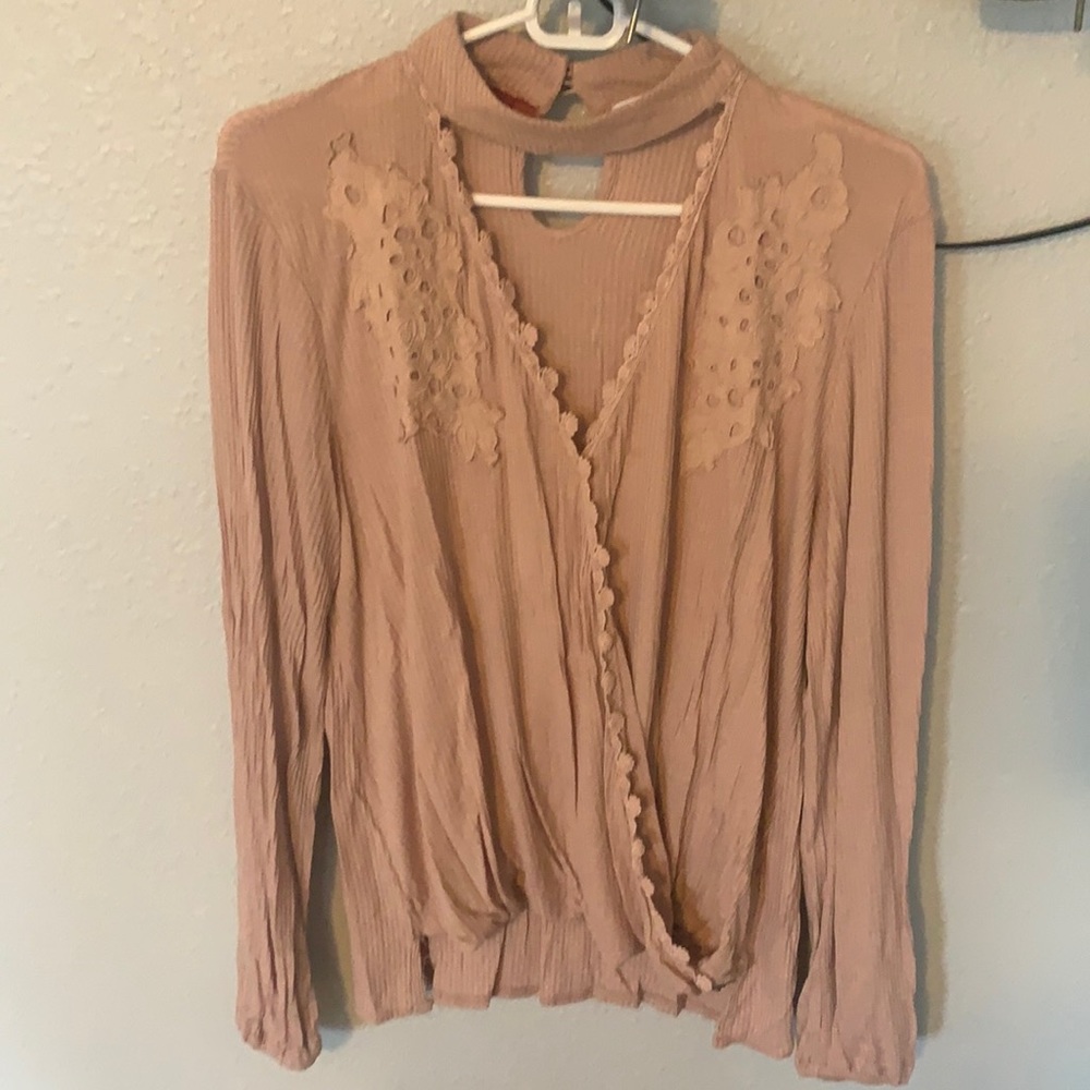 Long sleeve blush blouse with fun details!